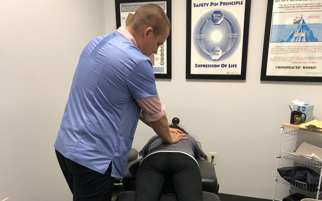 Chiropractor West Bend WI FJ Schofield Adjusting Patient