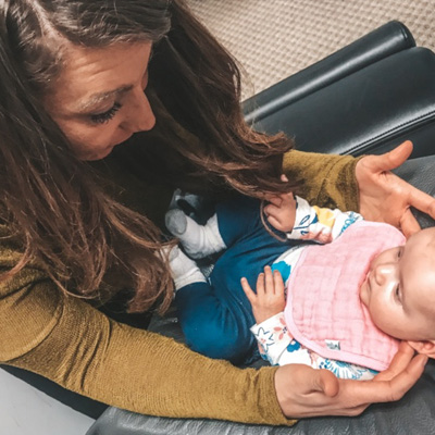 Chiropractor West Bend WI Terry Mellom With Baby